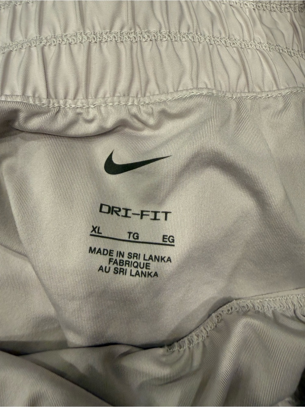 Nike Kids White Dri-FIT Athletic Sweatpants with Black Swoosh